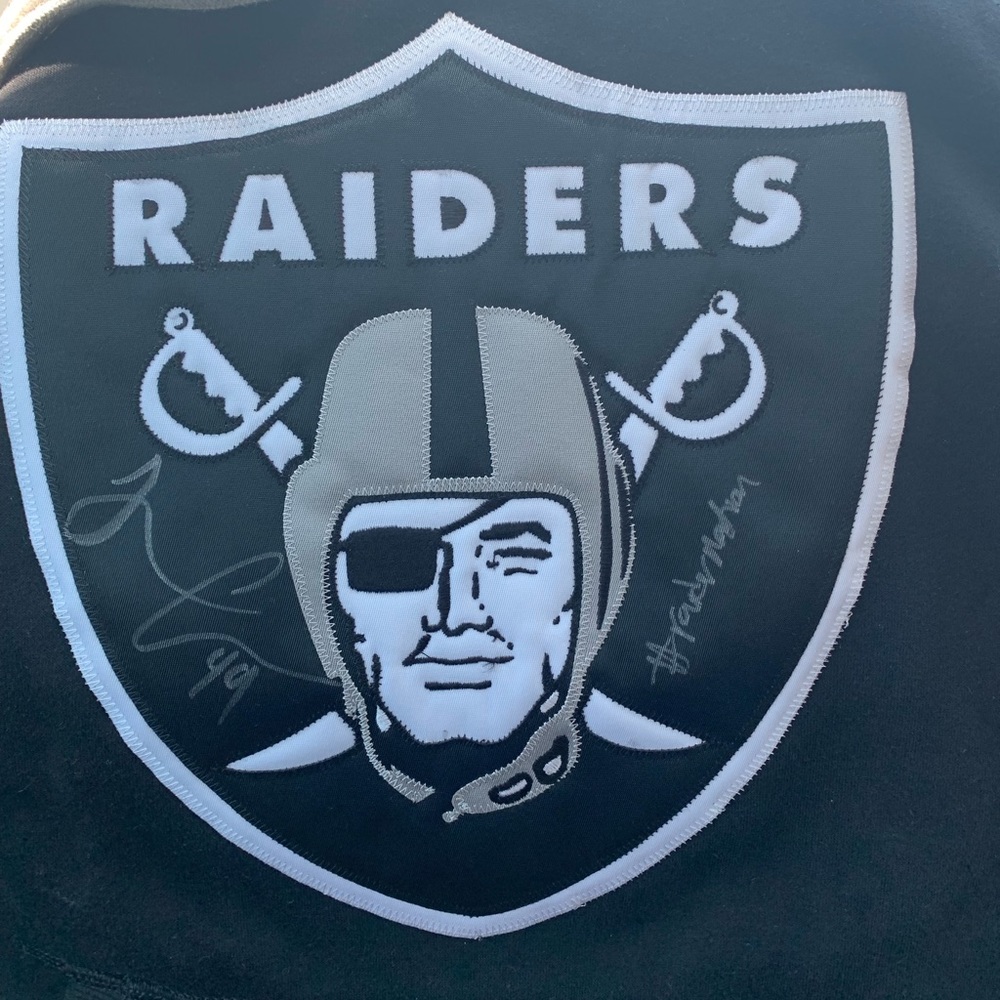 Signed NFL raiders hooded sweatshirt.